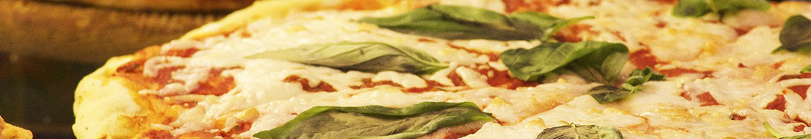 Eating Italian Pizza Sandwich at Luca's Pizzeria restaurant in Murfreesboro, TN.